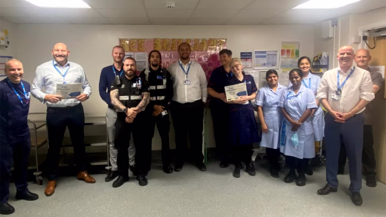 GSTS security officers and MFT clinical staff pictured together after receiving the WTWA Diamond Award for inclusive care at Manchester University NHS Foundation Trust.