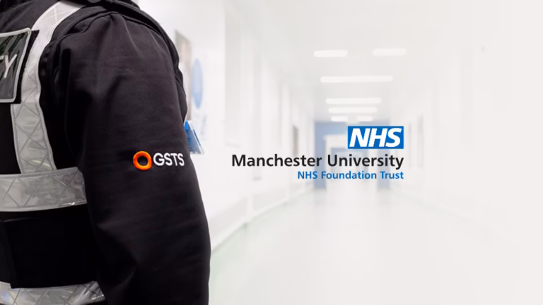 GSTS healthcare security officer in a Manchester University NHS Foundation Trust hospital corridor